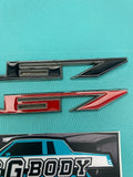 1978-1988 Gbody Chevrolet 267 Emblem Badge Pair Black Red OEM Genuine GM