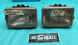 1980-1986 Gbody Monte Cutlass Regal Elco Headlight Bucket & Retainer SET OEM GM